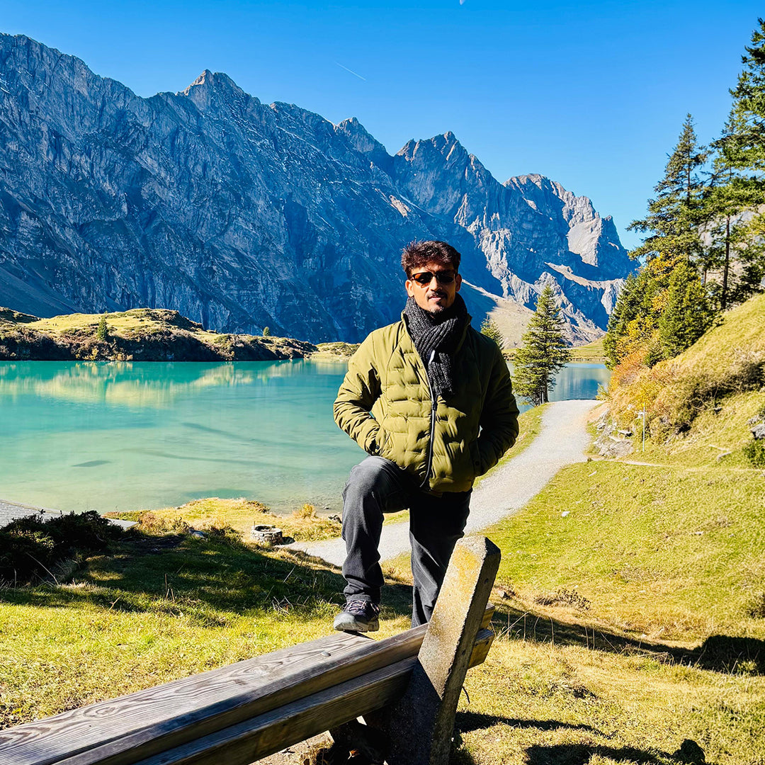 Founder in Himalayan mountains discussing herbal wellness traditions